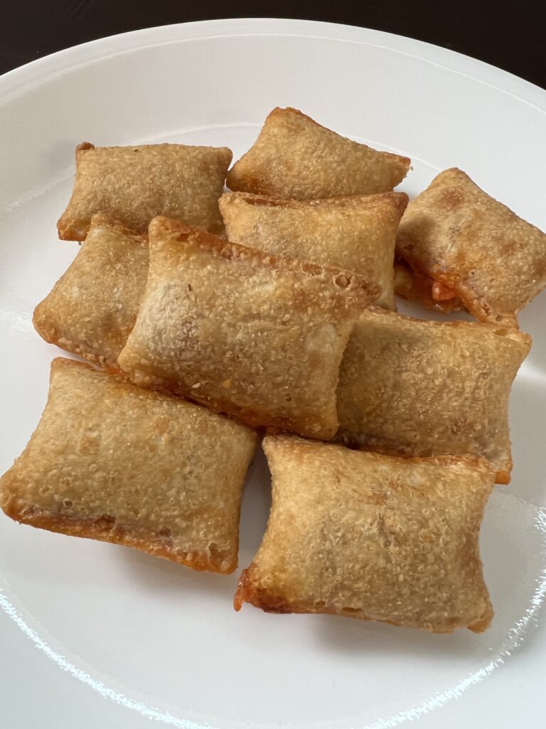 cooked pizza rolls on plate