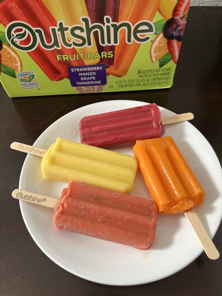 four outshine fruit bars on plate