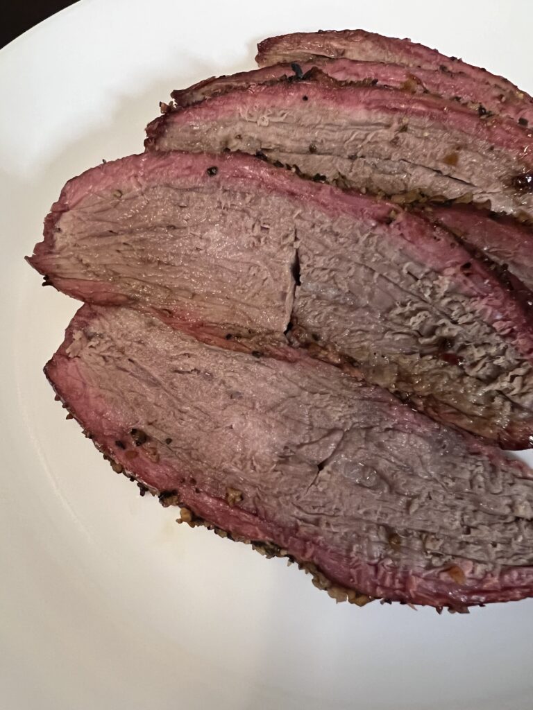 cooked tri tip cut up on plate