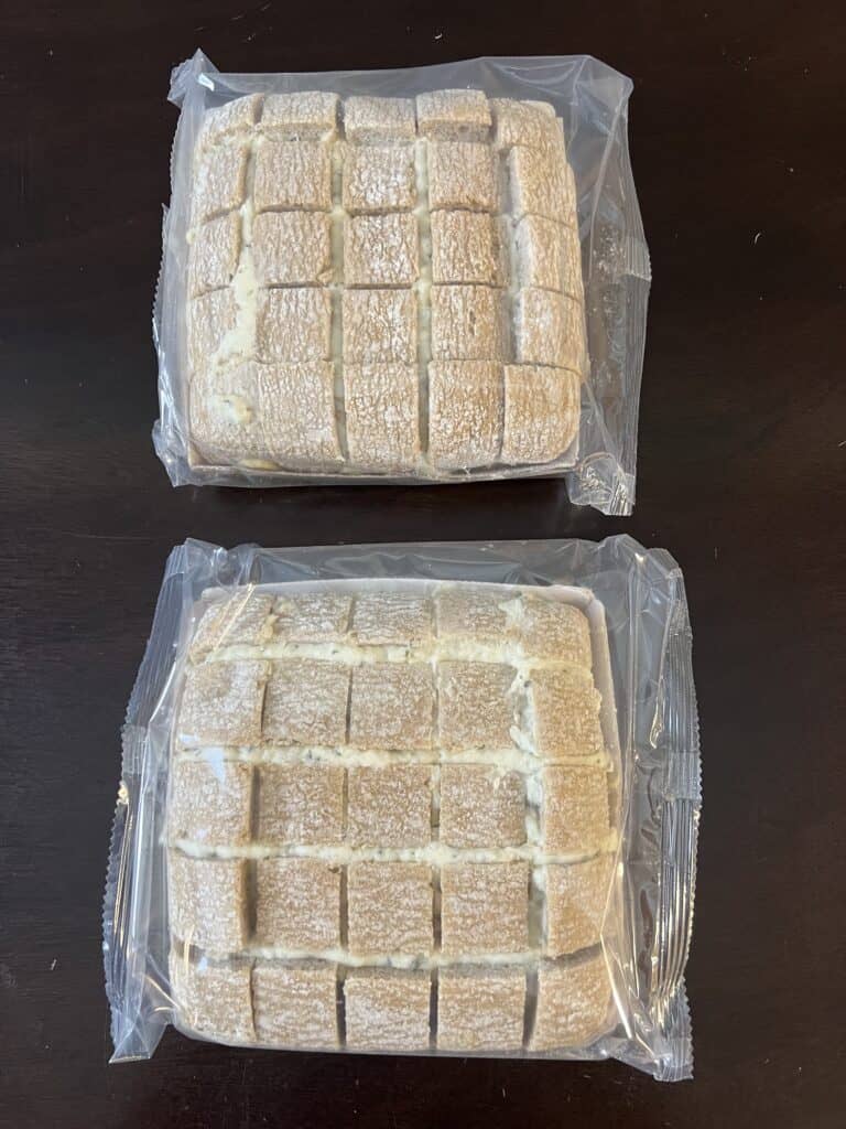 two loaves of cheese bread