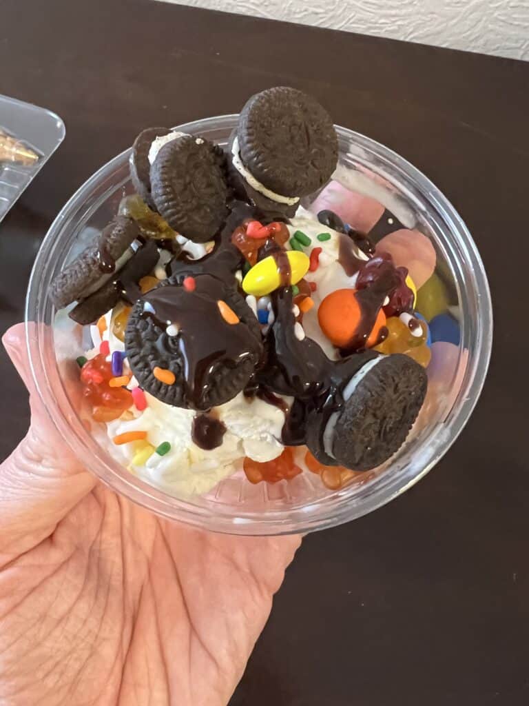 ice cream in cup with toppings